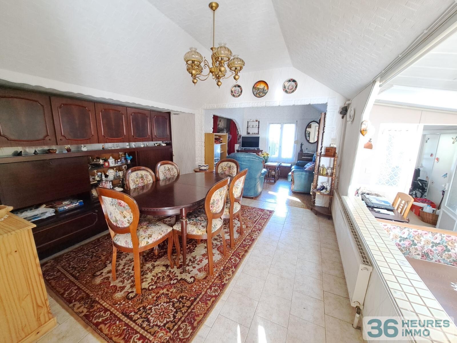 PLAIN PIED AVEC GARAGE ET JARDIN 