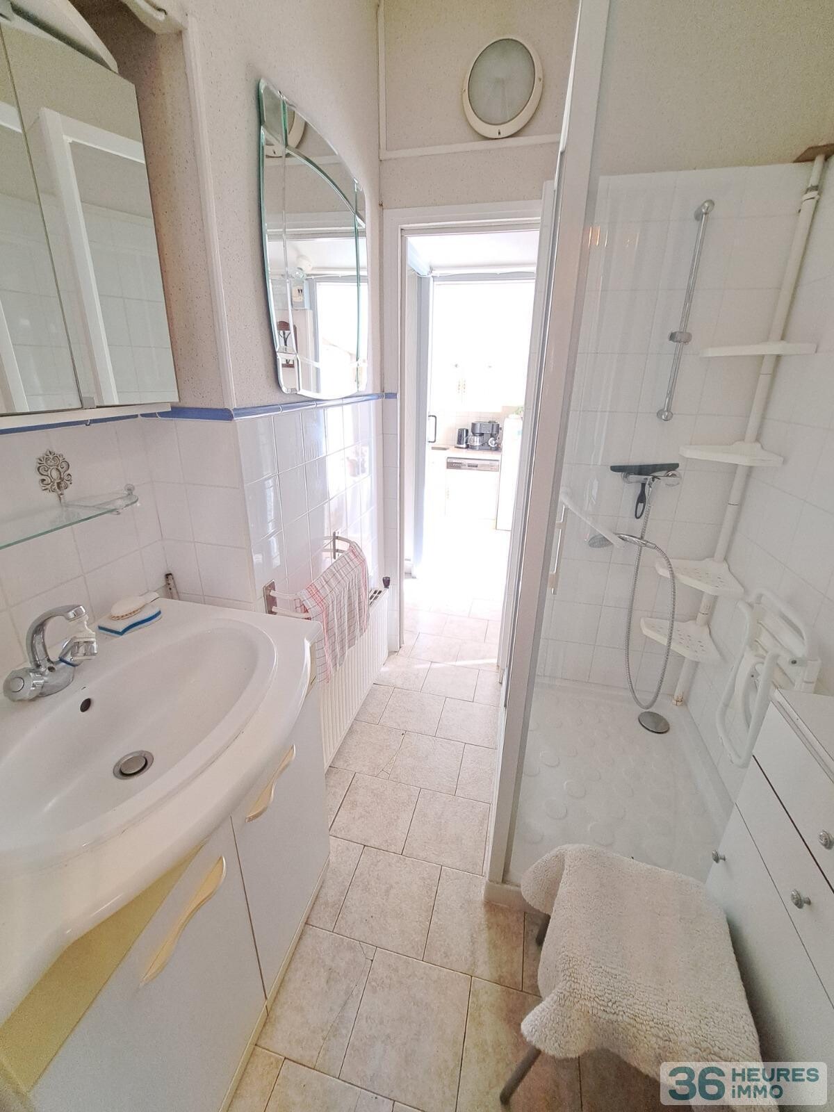 PLAIN PIED AVEC GARAGE ET JARDIN 