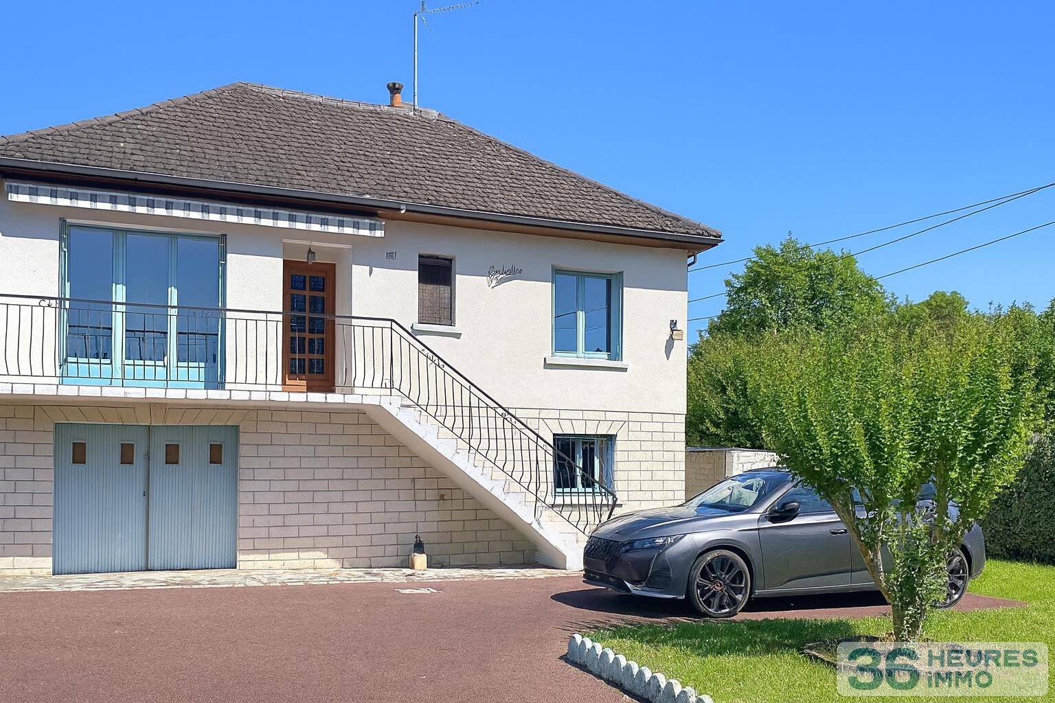 Maison avec jardin et sous-sol complet non enterré, à deux pas des commodités