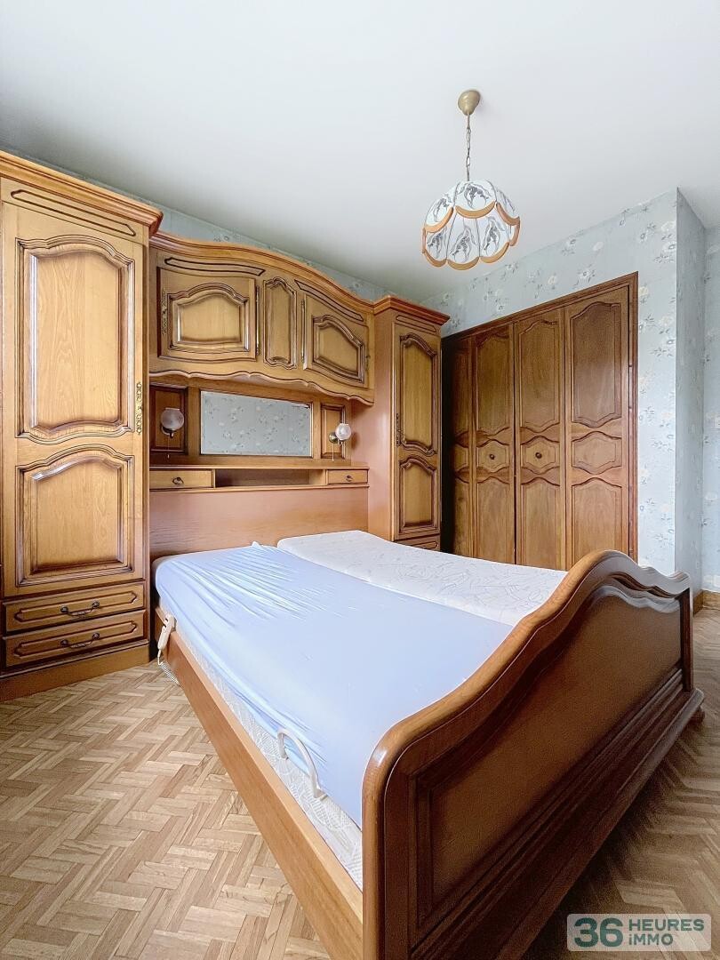 Maison avec jardin et sous-sol complet non enterré, à deux pas des commodités