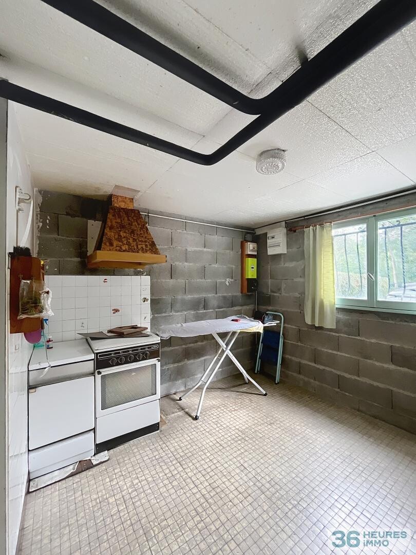 Maison avec jardin et sous-sol complet non enterré, à deux pas des commodités