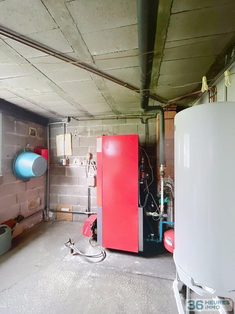 Maison avec jardin et sous-sol complet non enterré, à deux pas des commodités