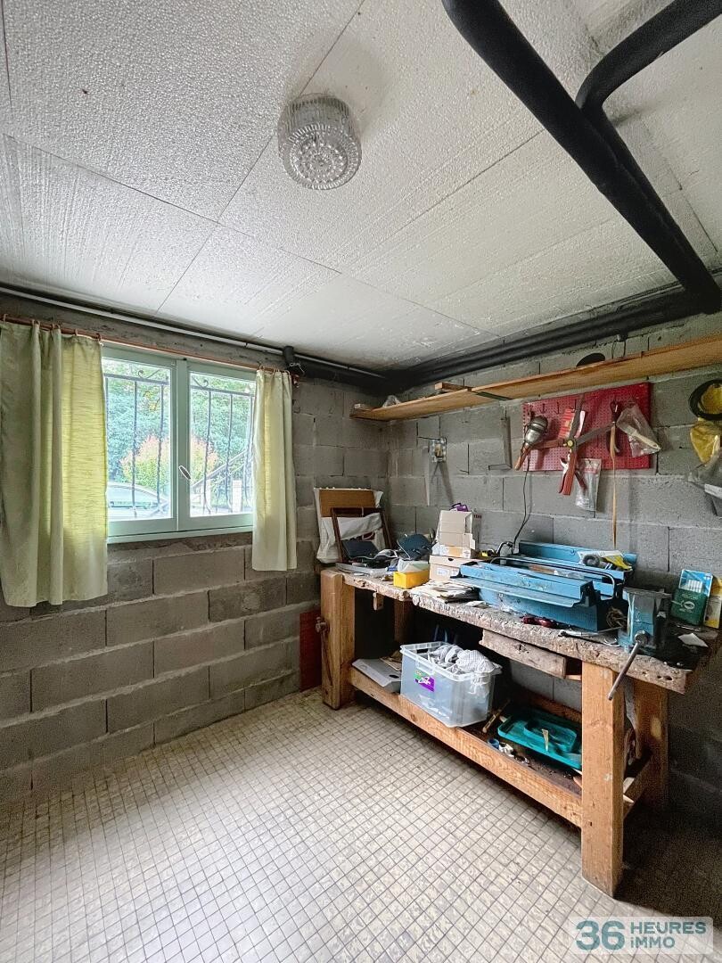 Maison avec jardin et sous-sol complet non enterré, à deux pas des commodités