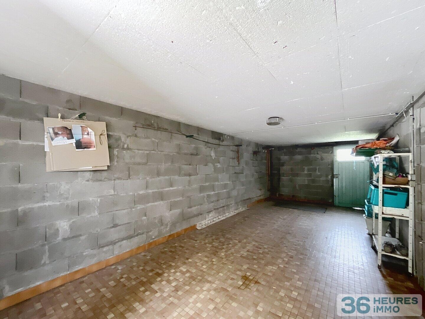 Maison avec jardin et sous-sol complet non enterré, à deux pas des commodités