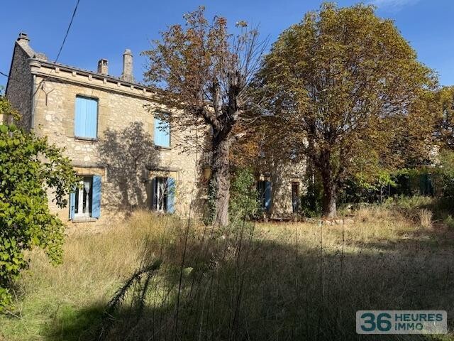 BASTIDE EN PIERRE, 8 PIECES + GARAGE SUR 701 M2 DE TERRAIN