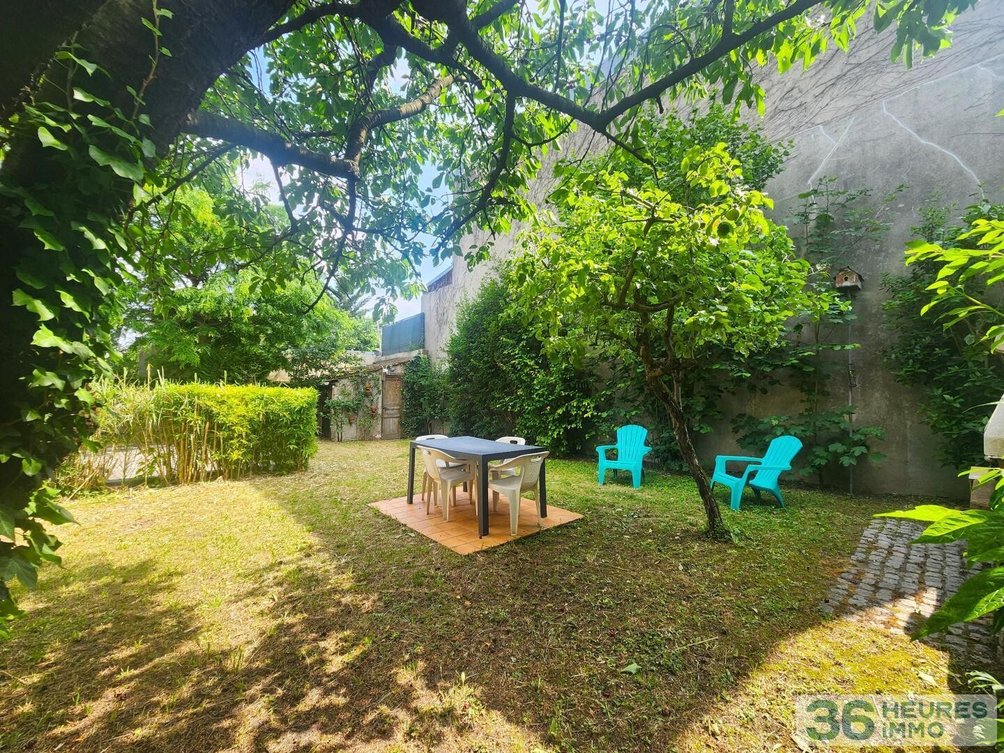 Maison avec sous sol et jardin