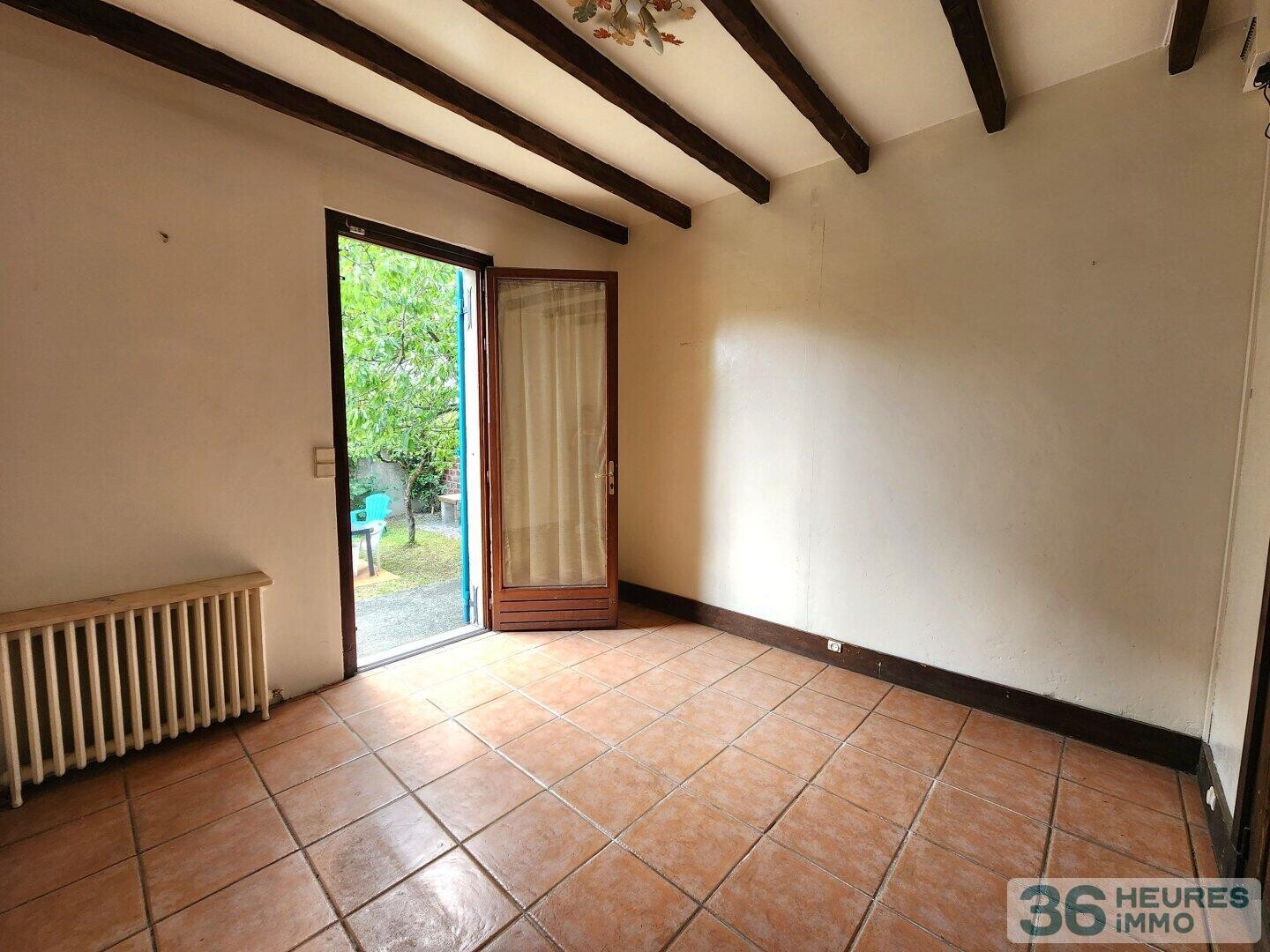 Maison avec sous sol et jardin