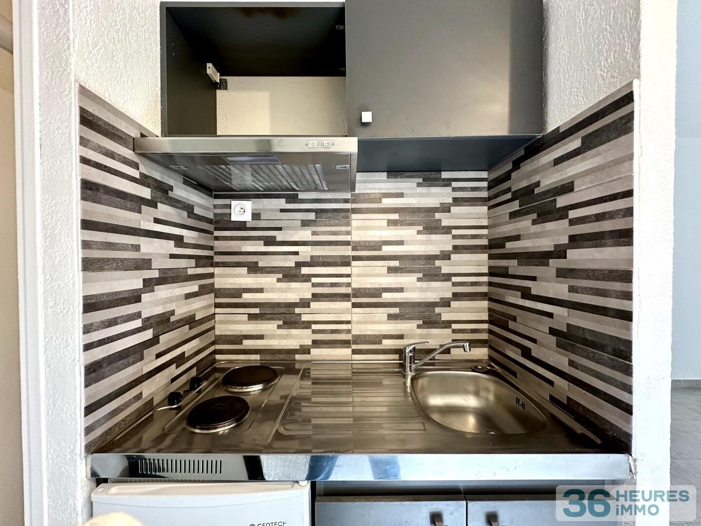 Studio rénové avec vue jardin dans résidence sécurisée