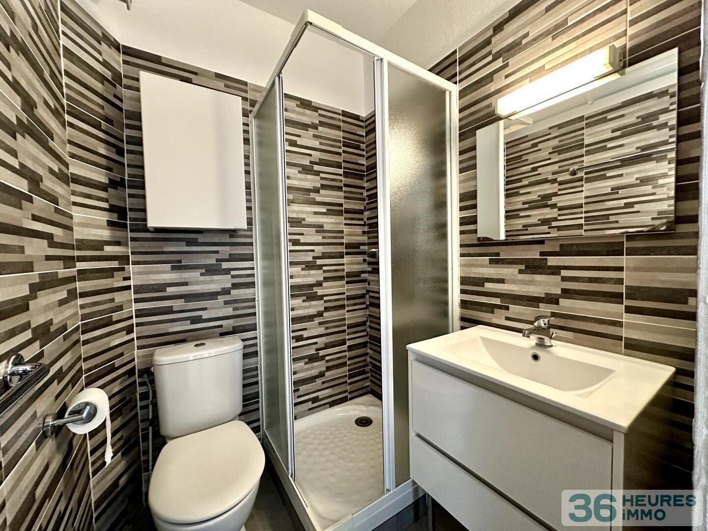 Studio rénové avec vue jardin dans résidence sécurisée