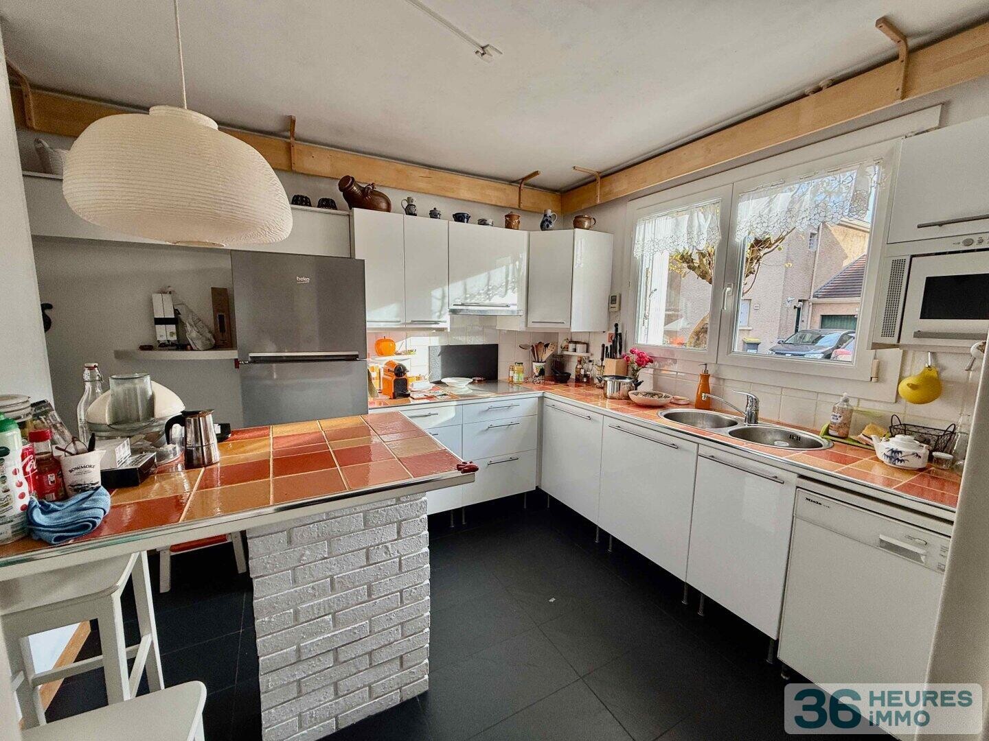 Maison 7 pièces avec jardin