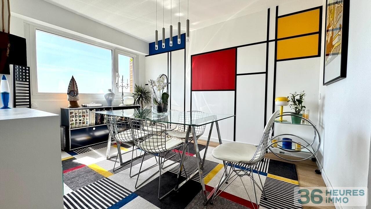 Appartement rénové de 95 m² avec balcon, parc privé et parking en sous-sol