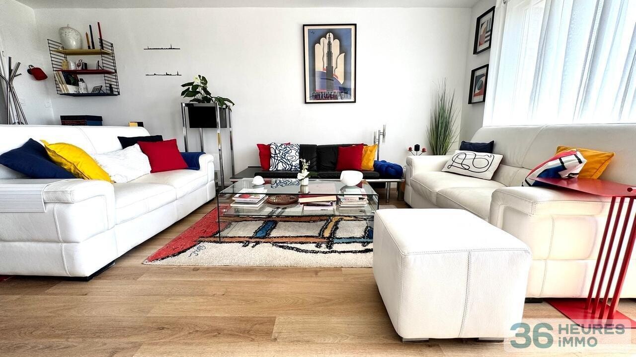 Appartement rénové de 95 m² avec balcon, parc privé et parking en sous-sol