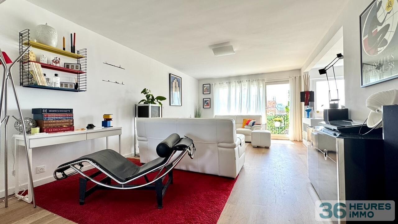 Appartement rénové de 95 m² avec balcon, parc privé et parking en sous-sol