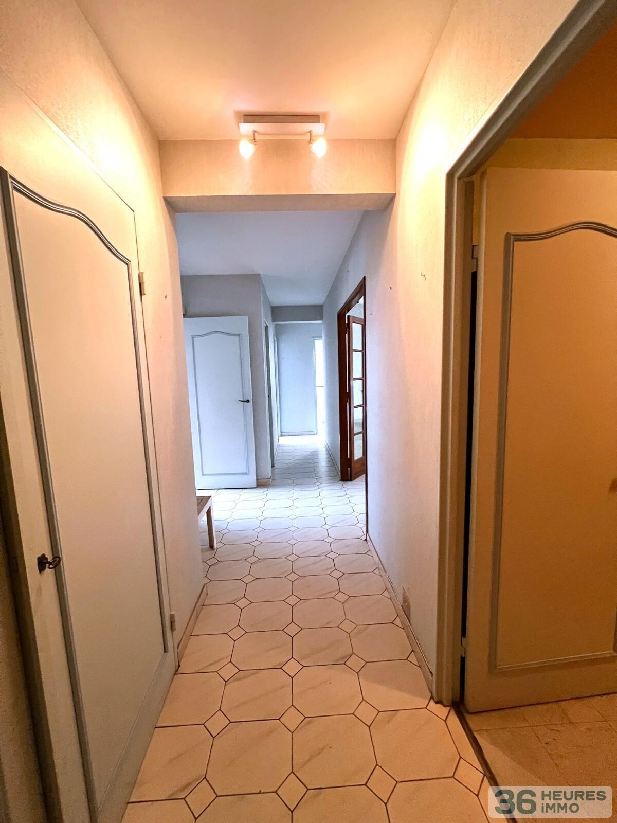  APPARTEMENT T4 AVEC BALCON ET CELLIER