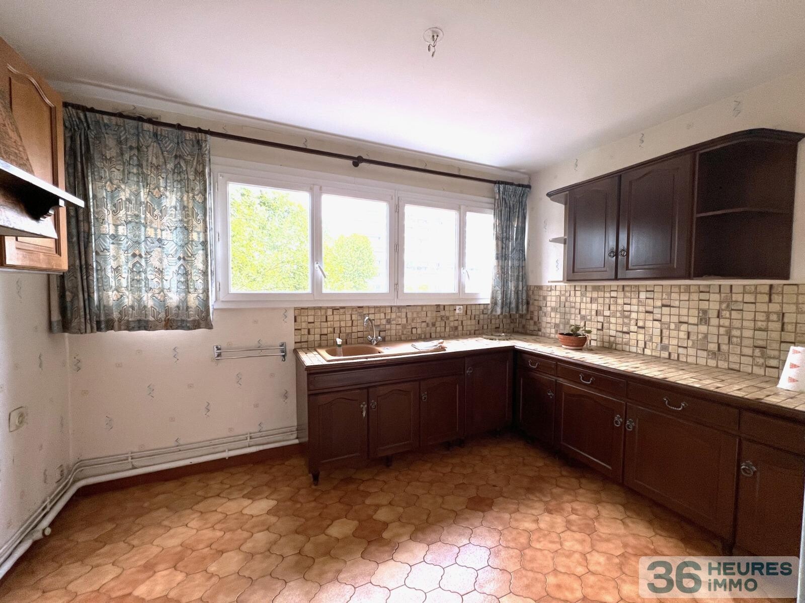  APPARTEMENT T4 AVEC BALCON ET CELLIER