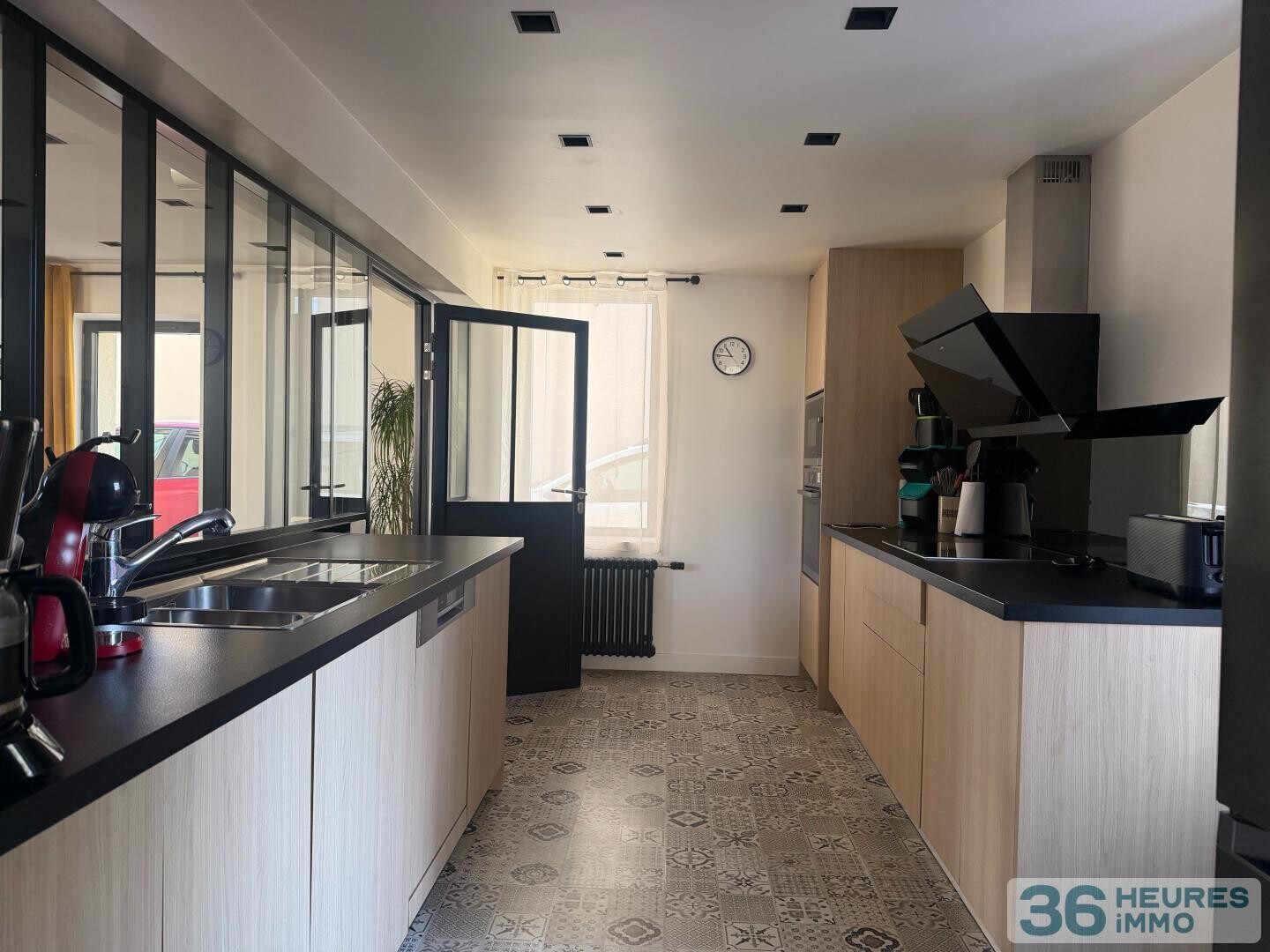 MAISON DE CARACTERE AUX VOLUMES EXCEPTIONNELS A ERAGNY