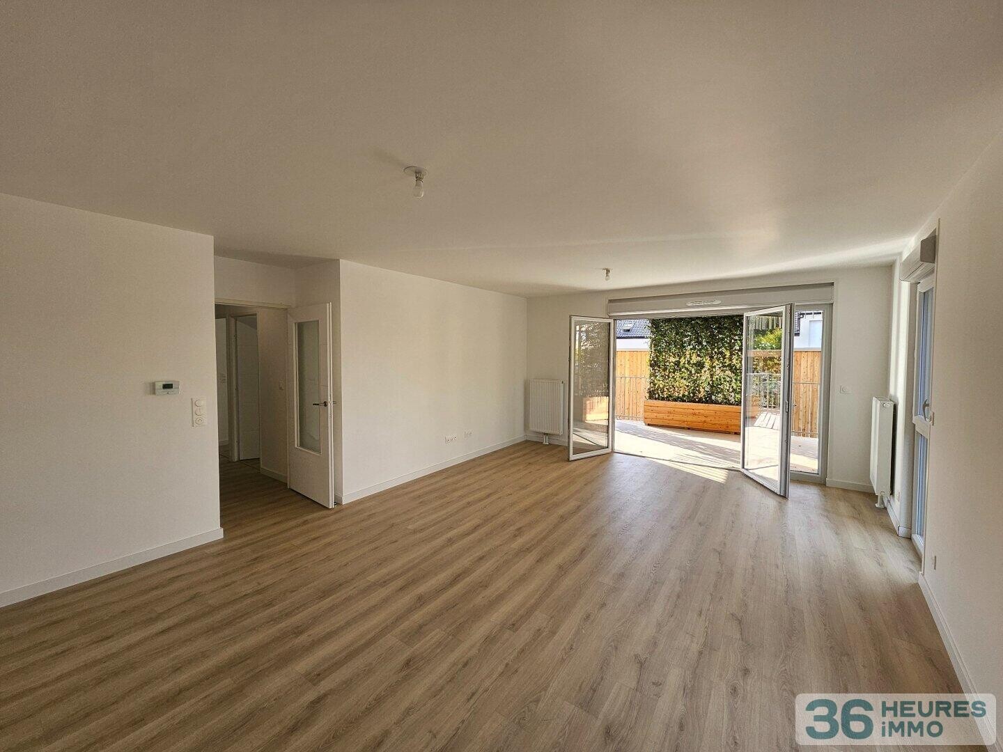 Appartement récent avec terrasse et  double parking