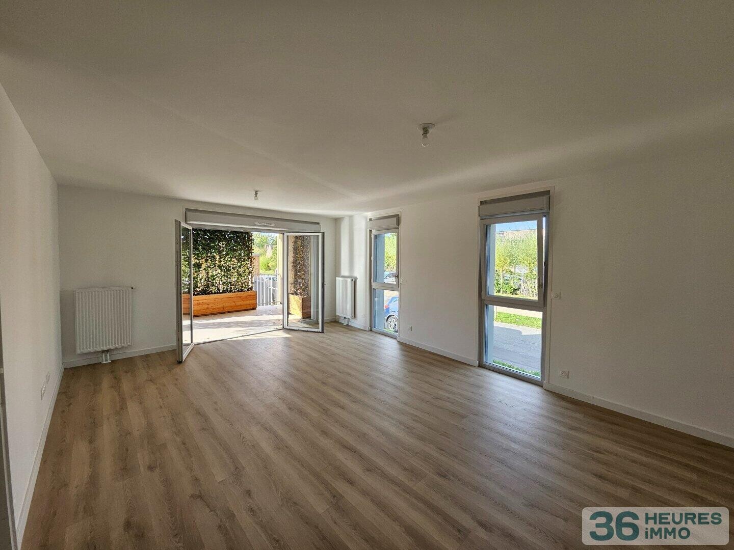 Appartement récent avec terrasse et  double parking