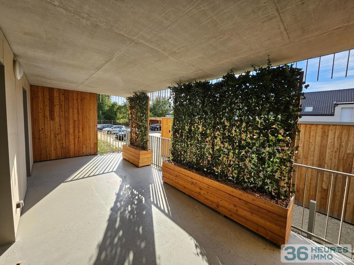 Appartement récent avec terrasse et  double parking