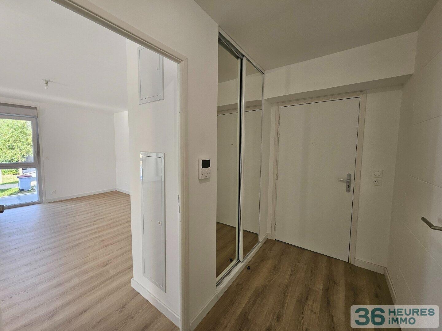 Appartement récent avec terrasse et  double parking