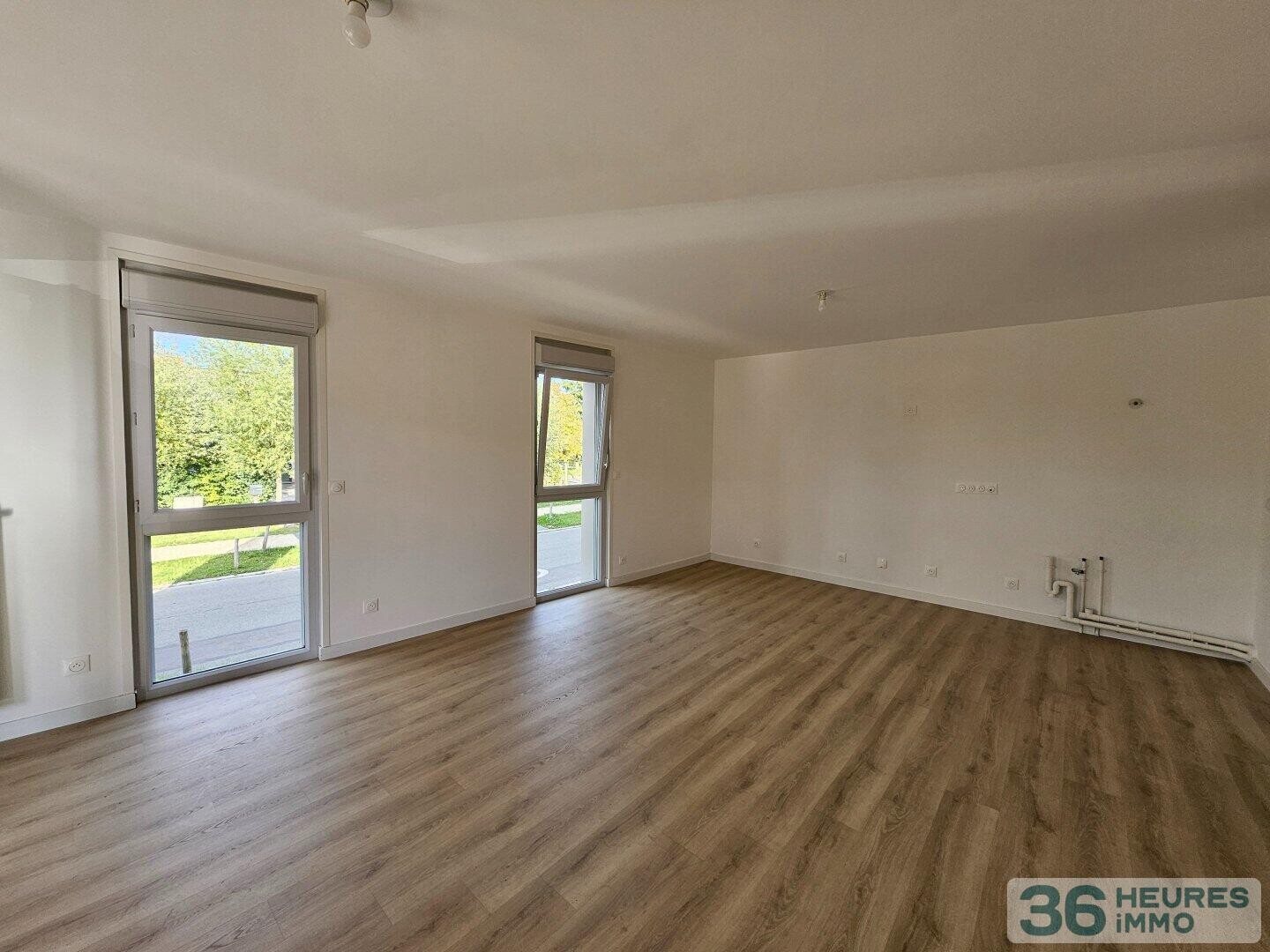 Appartement récent avec terrasse et  double parking