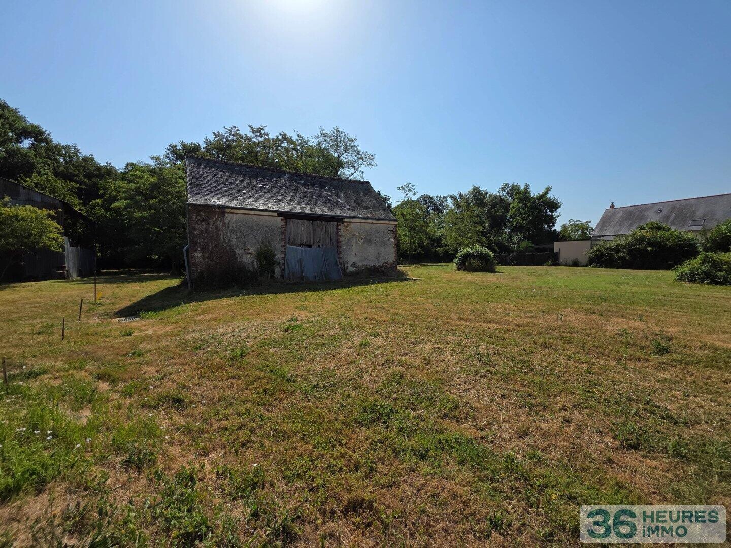 >Beau terrain avec grange 