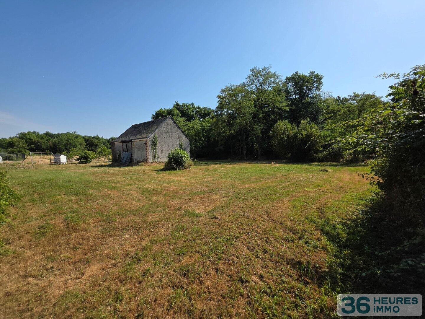 >Beau terrain avec grange 