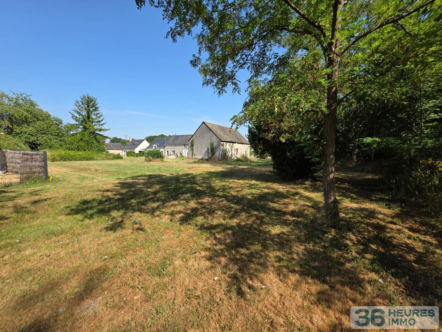 >Beau terrain avec grange 