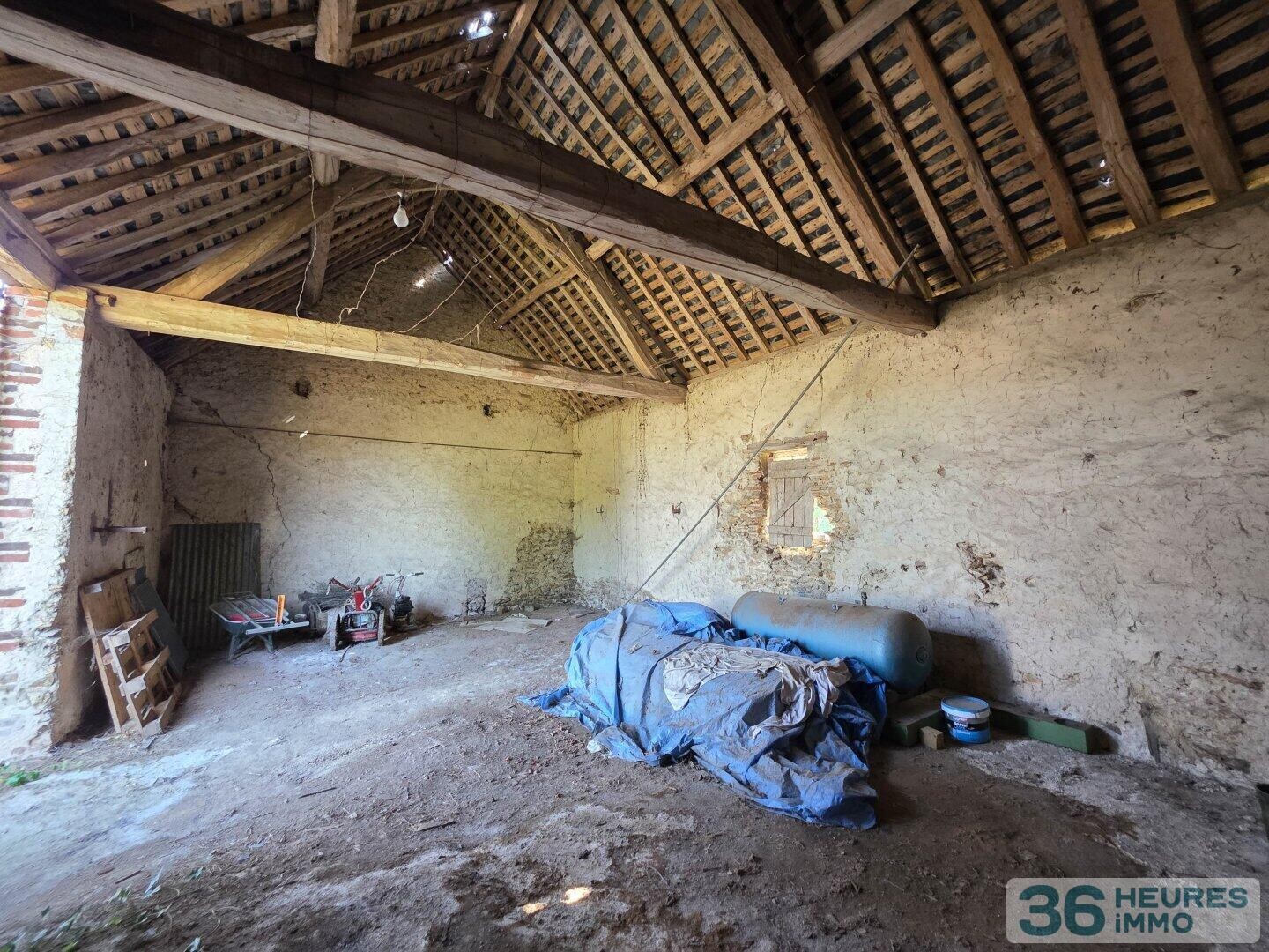 >Beau terrain avec grange 